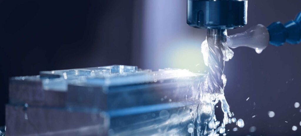 Closeup CNC milling machine during operation. Produced cutting metal parts, banner background of industry heavy factory.